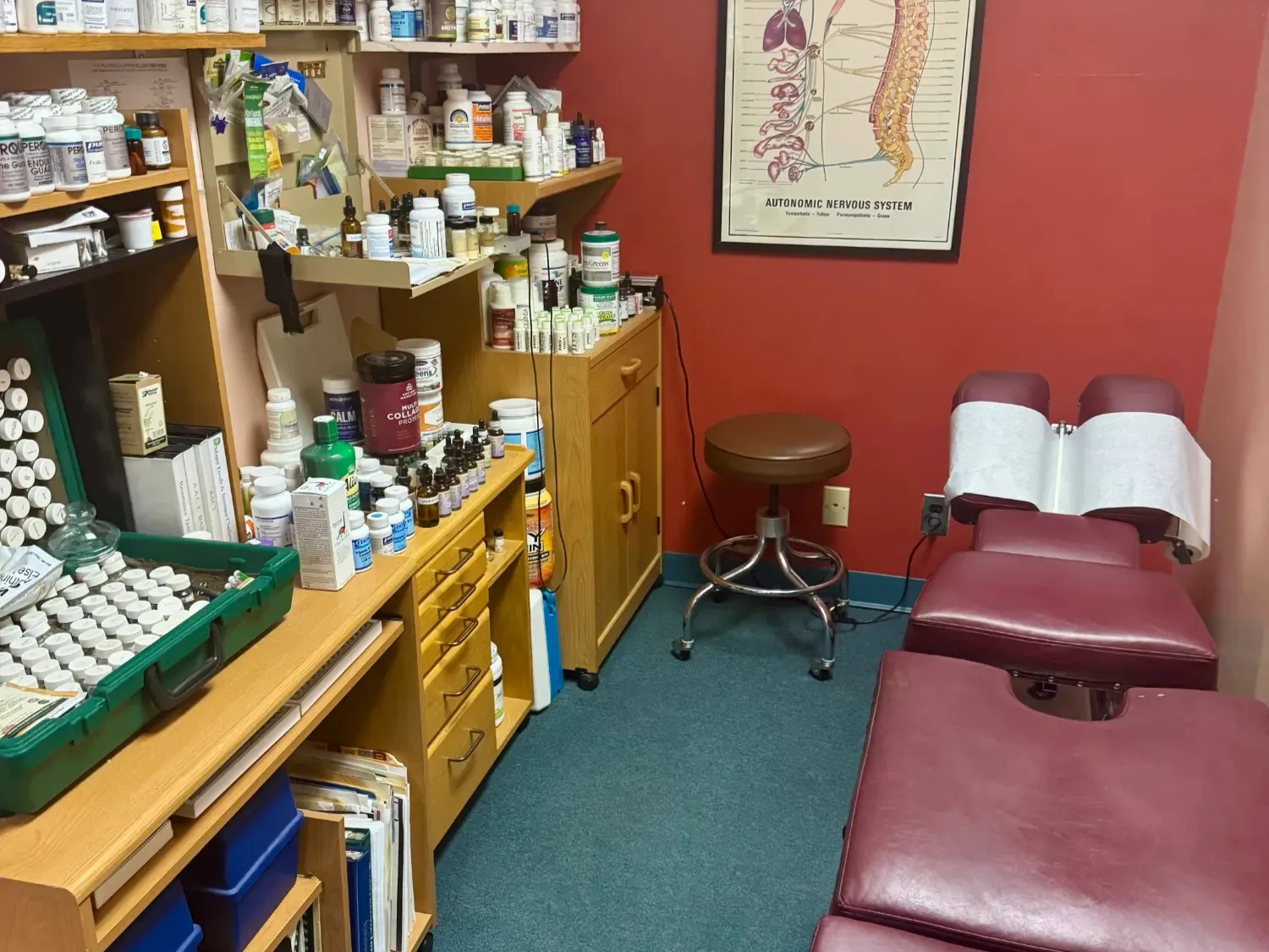 supplement and exam table Doctor helping patient with mobility and relieve pain